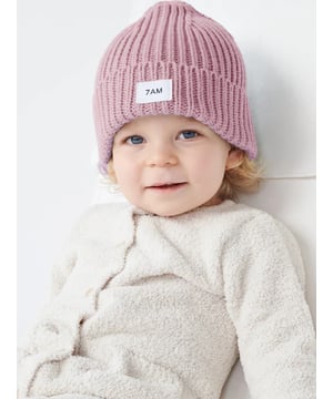 7AM weave sustainable and stylish materials into their urban outerwear aesthetics. This baby girls chunky beanie hat in pink is presented in a luxuriously soft, cotton knit blend via an elegant ribbed design. Perfect for keeping insulated on chilly days, they will look and feel effortlessly adorable.  True to Size Chunky Knit Elasticised Fit For the Utmost Comfort Ultra-Soft Premium Cotton Blend Exterior and Interior Machine Washable &amp; Dryable 60% Cotton, 40% Acrylic