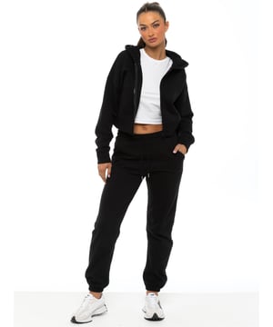 Enzo Womens Cropped Hoodie Tracksuit. Zip up sweatshirt with hood and sweatpants joggers set. Cropped hoodie and regular fit joggers with Cuffed design. Brushed back inner fleece. Cropped fit for casual wear. Essential loungewear tracksuit.