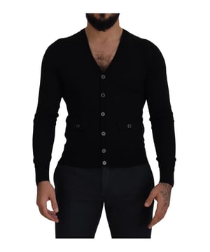 Suéter cardigan Dolce & Gabbana 100% auténtico  
Confeccionado en lana de calidad  
Color negro clásico  
Cierre completo con botones  
Detalles con logo  
Hecho en Italia  
Material: 100% lana virgen