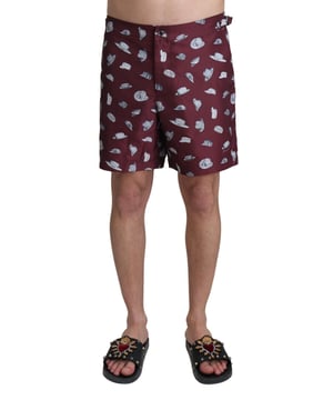 Absolut atemberaubende, 100% authentische, exklusive brandneue Badehose von Dolce & Gabbana mit Etiketten.  
2 eingesetzte Fronttaschen  
1 Reißverschluss-Rückentasche mit Hutdruck  
Modell: Swimshorts Trunks Boxer  
Farbe: Kastanienbraun  
Material: 100% Polyester  
Elastischer Taillenbund  
Zwei Fronttaschen und eine Rückentasche  
Logo-Details  
Toller Sitz und Komfort  
Material: 100% Polyester