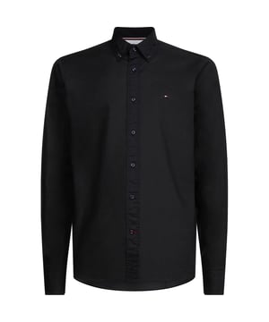 Heren overhemd van het merk Tommy Hilfiger. De overhemden van Tommy Hilfiger zijn gemaakt van biologisch katoen, en hebben een slim fit pasvorm. Het zachte katoen zorgt voor een heerlijk draagcomfort.  Merk: Tommy HilfigerModelnaam: Core Flex PoplinCategorie: heren overhemdMaterialen: biologisch katoenKleur: zwart