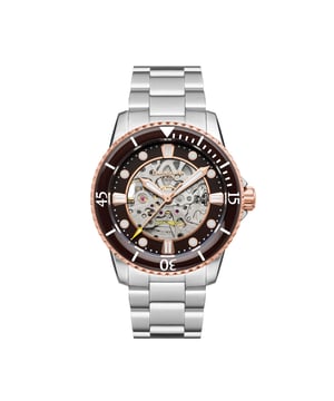 A handsome luxury diver with a skeleton automatic movement dial face opening demonstrates horological artistry framed inside the robust timeekeping design codes of a sports watch.