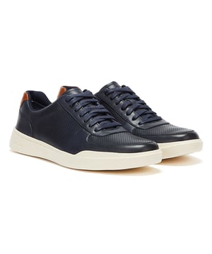 Zapatillas deportivas modernas perforadas de Cole Haan para hombre en color azul, fabricadas con piel y suela de goma. Incluyen: diseño de empeine perforado, marca Cole Haan, cuello del talón ligero y acolchado.