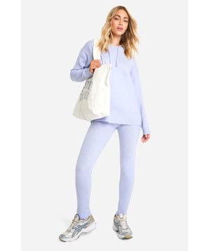 Soft knit co-ord set featuring a hoodie and trousers
        Relaxed fit hoodie with long sleeves and ribbed cuffs
        Matching high-waisted trousers with a slim fit
        Comfortable stretch fabric for all-day wear
        Versatile two-piece set for effortless styling
    
    Embrace comfort without compromising on style with this soft knit co-ord set from Boohoo. The relaxed fit hoodie pairs perfectly with the slim-fit trousers, creating a harmonious silhouette that's both trendy and cosy. Ideal for casual outings, this set can be dressed up or down with ease. Layer the hoodie over a simple tee and pair with trainers for a laid-back look, or style the trousers with a cropped top and heels for a night out with friends. The stretchy fabric ensures comfort for lounging at home or running errands. For a sporty twist, take inspiration from the model and team with chunky trainers and a roomy tote bag. This versatile co-ord is a must-have for the fashion-forward woman who values both comfort and style in her everyday wardrobe.