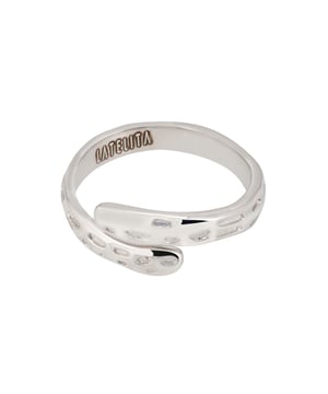 Embrace the whispers of the wild with our Nature's Embrace Band Ring in sterling silver. This ring, crafted from 925 sterling silver, takes inspiration from the rugged beauty of tree bark, achieved through a meticulous hammered texture. Weighing in at a mere 2.7 grams, this lightweight ring is as comfortable as it is stylish. Offered in four sizes, it's versatile enough to be worn solo for a subtle statement or as part of a bold midi-style stack. Transform your everyday look with this piece that beautifully blends modern design with nature's timeless patterns.