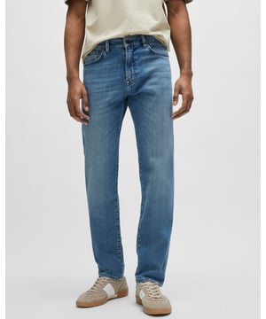 Soft jeans cut to a straight fit with a tapered leg by BOSS Menswear, crafted in comfort-stretch denim with a worn-in blue hue.
Regular fitRegular riseButton and zip closurePockets bottom front: Side pocketsTapered legPockets bottom back: Patch pocket
98% Cotton, 2% Elastane
50514237
 