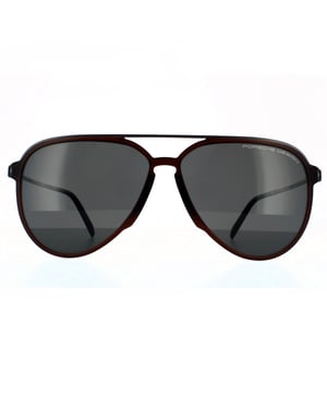 Porsche Design Aviator Hombres Marrón Gris Gris Polarizado AR 90041091. Las gafas de sol Porsche Design son de estilo aviador, elaboradas en plástico ligero. La delgada barra superior y las puntas de las patillas de plástico garantizan comodidad durante todo el día. El logo de Porsche está grabado en las delgadas patillas para asegurar su autenticidad.