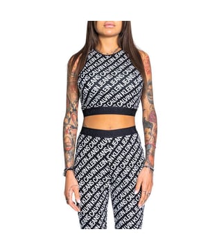 Calvin Klein Unlimited Logo Damenshirt Schwarz Baumwolle. Authentisches Kleidungsstück der Marke Calvin Klein - Streetwear/Sportswear-Design von Calvin Klein - Calvin Klein für modebewusste Frauen, perfekt für den Alltag - Das schwarze Calvin Klein Tanktop lässt sich hervorragend mit den anderen Teilen Ihrer Garderobe kombinieren - bequemer Baumwollstoff - klassisch - Unlimited Logo -