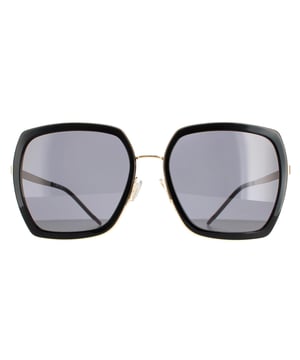 Las gafas de sol Hugo Boss Square Womens Gold Black Gray Boss 1208/s son un moderno estilo cuadrado fabricado en metal ligero. Las plaquetas nasales de silicona y las puntas de las patillas de plástico garantizan la comodidad durante todo el día. El logotipo de Hugo Boss aparece en las patillas delgadas para dar autenticidad a la marca.