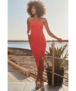 Give your LBD a night off Cut to a figure-hugging pencil silhouette Sexy bandeau neckline and split hem Chic button front detail Red always turns heads Just add barely-there heels