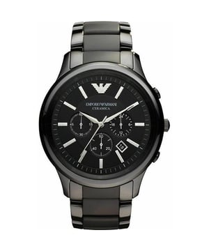Step into a world of sleek sophistication with the Emporio Armani Watch, model AR1451. This impeccably designed timepiece boasts an all-black ceramic bracelet and case, exuding a contemporary and stylish edge. The black dial features contrasting white markers and hands, providing clarity and elegance. Chronograph functionality and a date window at the 4 o'clock position with practicality to match its aesthetic appeal. A quartz movement ensures precise timekeeping, while its water-resistant properties afford durability. This watch is a true reflection of Emporio Armani's dedication to high-end style and precise engineering. Specification Details Brand Emporio Armani Model AR1451 Barcode Number 723763183499 Gender Men's Case Diameter 47 mm Case Material Ceramic Case Colour Black Dial Colour Black Band Material Ceramic Band Colour Black Movement Quartz Water Resistance 5 ATM Features Chronograph, Date Indicator