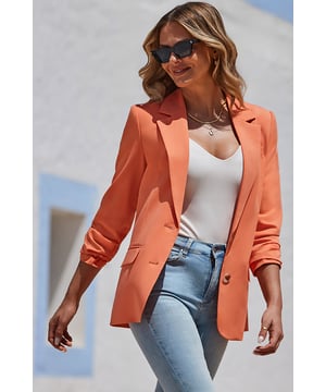 The bolder the better Cut for an on-trend relaxed fit Flattering longline hemTortoiseshell button fastening for a luxe feel Mood-boosting orange hue looks amazing with blue denim Add a white top to make it really pop