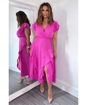 Our Cerise Frill Detail Double Split Skirt Midi Dress is right on trend this season! Featuring a v neck wrap top, short frill sleeves, a frill detail double split skirt and a zip up back.  Style with heels and a matching bag.   Model wears: UK 8/ EU 36/ US 4 Model's height: 165cm/ 5'5" Approx length from centre back to hem: 134cm Fabric composition: 100% Polyester Colour: CERISE