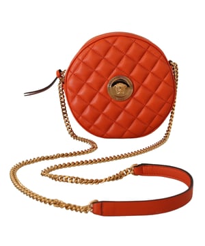 A estrenar con etiquetas y bolsa guardapolvo.
  Bolso bandolera redondo 100% autentico de Versace.
  Color: Rojo.
  Material: Napa.
  Cierre de cremallera.
  Logotipo de la cabeza de Medusa.
  1 compartimento principal.
  Bolsillo interior.
  Herrajes dorados
-.