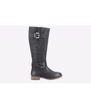 Zwarte dameslaarzen van Hush Puppies estelle, vervaardigd van leer en een rubberen zool. Kenmerken: ritssluiting aan de binnenkant, dubbele gespen, fleecevoering, rubberen zool en leren bovenwerk.