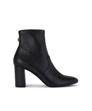 The Kurt Geiger Langley Ankle Boot features a black leather upper. The ankle features a zip closure and antiqued brass eagle head on the back. Heel height: 8cm.