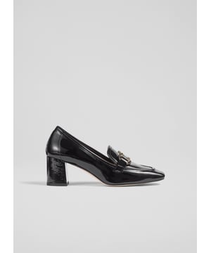 Experience sophistication with Luca block heel snaffle courts. In timeless black patent leather, these Spanish-crafted shoes feature a sleek square toe, painted trim and a stylish block heel, perfect for smart-casual elegance. Pair them effortlessly with tailored trousers or your favourite dress for a polished look. Made in Spain.