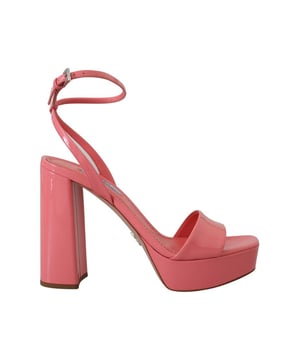 Brand: PRADA
  Condition: Brand new with tags
  Model: Block heels platform sandals
  Color: Pink
  Material: 100% patent leather
  Leather bottom sole for durability
  Logo details showcasing the iconic PRADA brand
  Made in Italy with high craftsmanship
  Exclusive and luxurious design
  Perfect for fashion-forward women
Material: 100% patent leather
