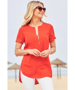 REASONS TO BUY: 

A top you can always rely on
Turn heads in red
Luxe gold zip detail
Smart enough for work, comfy enough for play
Perfect with jeans and heels
Pair with white shorts to stand out.