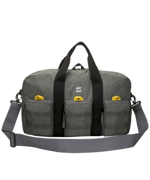 The ultimate carry companion, perfect for every day wear. Featuring a full-length zip top opening and 3 large side pockets, the Haring Triple Holdall is spacious enough for any short or long trip away. Features a detatchable shoulder strap. Features: , Water Resistant, 15 inch padded laptop sleeve - Fits Apple MacBook Pro 16 inch, Grab handle carry straps, Removable shoulder strap allowing crossbody styling, Zip top opening to main compartment, Triple front zip pocket with webbing loops Single zip pocket for smaller valuables, Internal zip pocket, 2 Internal mobile phone slip pockets - Fits normal and plus size smart phones, 3 Internal pen slip pockets, External rear zip pocket Style Ref: 52004 GREY
