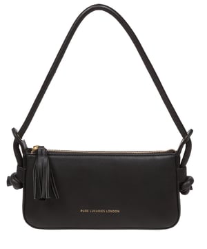 The 'Taylor' grab bag from Pure Luxuries London's Knightbridge collection is handcrafted from gold standard Nappa leather with a super-soft and smooth finish. The compact main compartment is secured with a zip-over top featuring a tassel and opens to reveal a 100% cotton-lined interior. Three card slots and a small slip pocket line the interior - ideal for all your essentials in one organised place. Eye-catching metal fittings and zips give this bag an iridescent look. A unique slip-tied strap with a drop length of 28cm adorns the bag. This strap can be tied lower to adjust the drop length of the strap. The Pure Luxuries logo is embossed in gold foil for a beautifully simple finishing touch.