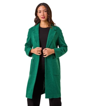 Boucle Knit Longline Coatigan from Roman. Add a timeless classic to your collection with this coatigan. Designed in a classic longline shape this piece features a relaxed rever collar, edge to edge opening and cosy full-length sleeves. This coatigan is the perfect addition to your wardrobe for the transitional season. Dress it up or down to suit any occasion, this versatile piece also features patch pockets. Pair this jacket with a pair of jeans and a high-neck jumper for an ultra-cosy finish!