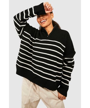 Half-zip neckline for adjustable coverage
        Bold striped pattern for eye-catching style
        Relaxed, oversized fit for ultimate comfort
        Ribbed cuffs and hem for a snug finish
        Versatile design suitable for various casual occasions
    
    Make a statement in this striking striped jumper, perfect for the fashion-forward petite woman. The half-zip neckline adds a sporty touch while allowing you to customise your look. Its relaxed, oversized silhouette offers both style and comfort, ideal for those laid-back days when you want to look effortlessly chic. Pair it with wide-leg trousers and trainers for a trendy casual ensemble, or throw it over a midi skirt and ankle boots for a more put-together look. Whether you're meeting friends for coffee or heading to a family gathering, this jumper is your go-to piece for versatile, on-trend style. The bold stripes and cosy knit fabric make it a standout item in your wardrobe, ready to take you from season to season with ease.