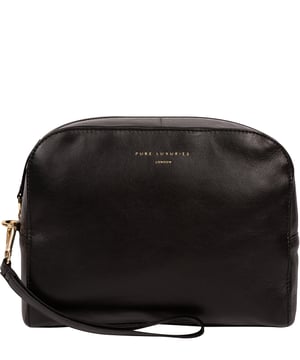 The 'Brompton' leather cosmetic bag is handcrafted from a luxurious smooth grain natural leather for a soft-touch and stylish finish. A capacious central compartment lined with natural, untreated 100% cotton is secured by a robust zipover top and two slip pockets on the interior are ideal for maintaining an organised bag. Comes with a detachable wrist strap. Finished with the iconic Pure Luxuries gold foil embossed logo and presented in a 100% cotton branded Pure Luxuries pouch.