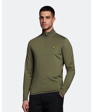 De Lyle & Scott Tech 1/4 Zip Midlayer wordt snel een garderobe die essentieel is voor elke golfer die de elementen hem niet in de weg laat staan. Ontworpen om mobiliteit en ademend vermogen te verbeteren, evenals vocht van je huid, dit stuk van het polyester-elastaan ​​zal je je de hele dag fris en er scherp uitzien. Met Heavy Duty Sports Zip en eindigde met onze kenmerkende Golden Eagle. \n \nFit: slank\nOntworpen om u een op maat gemaakte pasvorm te geven die beter de lijnen van het lichaam volgt dan onze normale gesneden kleding. Als u tussen twee maten wordt gevangen, raden we u aan het grotere formaat te kopen.