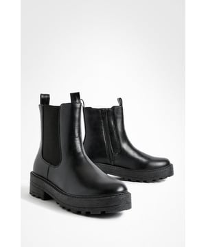 Chunky Chelsea boot design with double tab detail
        Wide fit for enhanced comfort
        Flat heel between 0 and 2cm for easy all-day wear
        Elastic side panels for easy slip-on
        Durable synthetic materials for long-lasting wear
    
    Step out in style with these versatile wide fit Chelsea boots. The chunky sole and double tab detail add a contemporary edge to this classic silhouette, perfect for the fashion-forward trendsetter. Pair them with cropped trousers and an oversized jumper for a chic daytime look, or dress them up with a flowy midi skirt and leather jacket for evening drinks. The flat heel and wide fit ensure comfort for all-day wear, whether you're running errands or dancing the night away. These boots are ideal for casual events and family gatherings, offering a perfect blend of style and practicality. Their robust construction makes them a reliable choice for various weather conditions, while the sleek design allows for effortless styling across multiple outfits in your wardrobe.