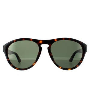 Las gafas de sol Gucci Aviator para hombre en color havana verde GG0747S son un estilo de piloto suave, elaboradas con acetato grueso y ligero. Cuentan con un puente en forma de llave y la marca Gucci en las patillas.