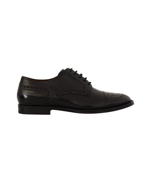 Marca: Dolce & Gabbana.
  Modelo: Wingtip Oxford Formal Shoes.
  Color: Negro.
  Material: 100% cuero.
  Suela: Cuero.
  Detalles del logotipo.
  Fabricado en Italia.