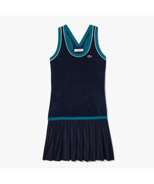 Lacoste Slim-Fit Cross Back Terry DressFrench chic met een sportieve twist. Deze iconische badstof katoenen jurk is zowel comfortabel als stijlvol met een gekruiste rug en geplooide rok. Scherpe op tennis geïnspireerde stijl.- Organisch katoenen badstof - Contrasterende boorden - Contrasterende taille - Geborduurde krokodil op borst- Hoofdstof: 83% Katoen 17% Polyester.  Rok: 100% Polyester.  Machinewasbaar.- Ref: EF7235-166