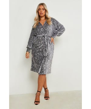 This plus size wrap dress is about to become your new go-to. With a wrap-around design that cinches you in at the waist and creates a soft V neckline, there's no denying a plus wrap dress deserves a place in your dresses collection. Whether you're loving floral styles, understated black or statement red for date night, it's time to show off your figure in this flattering dress.Style: Wrap DressFabric: VelvetLength: MidiSleeve Length: Long Sleeve