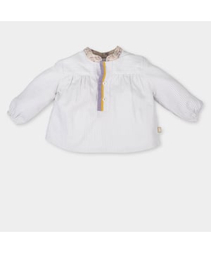 Long sleeved shirt.
 Mao style collar.
 Half-height button closure on the front.
 Elastic cuffs.
 Flared cut.
 Composition: 100% cotton
 Care:
- Wash maximum at 30ºC.
 - Iron at medium temperature, max. 110ºC.
 - It is not allowed to use a dryer.
 - Do not use bleach.
 - Does not support dry cleaning.