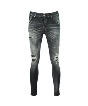 Dsquared2 Super Twinky Jean Paint Splash Destroyed Jeans. Super Twinky Jean S74LB0810 S30503 900. Stretch Denim 92% Cotton, 6% Elastomultiestere, 2% Elastane. Button Fly, Skinny Fit With A Tapered Leg. Paint Splash Detail, Destroyed Reinforced Denim. Made In Italy