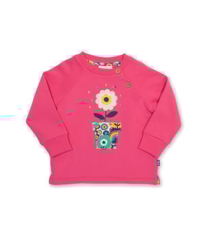 100% organic cotton | Proud to be certified to the Global Organic Textile Standard (GOTS) | Flower appliqué featuring our patchwork planet print | OEKO-TEX Standard 100 (Product class I) appliqué backing | Petal pink | Brush back sweat fabric 3 ply (290-300 gsm) | Coconut button raglan sleeve opening (up to and including size 3 years) | Long sleeved | Round neck | Ribbed neckline and cuffs | Made in Turkey | Machine washable at 40 degrees, or at 30 degrees to be kinder to the planet