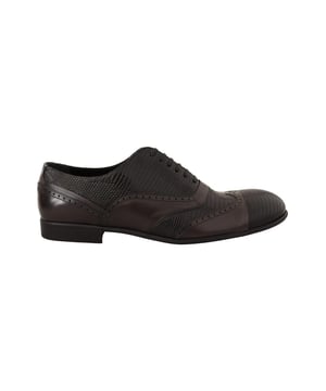 Merk: Dolce & Gabbana
  Model: Oxford schoenen
  Kleur: Bruin
  Materiaal: 60% Varana hagedis 40% Leer
  Zool: Leer
  Logo details
  Vervaardigd in Italie
  Zeer exclusief en hoog vakmanschap