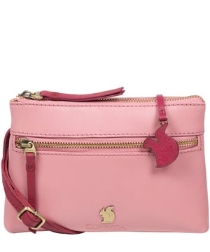 The 'Sweetie' cross body bag from Conkca London is handcrafted from multi-toned leather for a beautiful finish. A zip-over top opens to reveal a spacious yet compact main compartment with two slip pockets, lined with natural and untreated 100% cotton. Features a zipped pocket on the front and a slip pouch on the rear, ideal for on-the-go storage. Comes with an adjustable leather strap with a maximum drop length of 70cm. Adorned with the inimitable Conkca squirrel charm and Conkca logos.