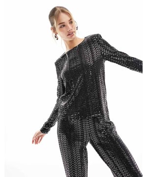 Tops by Pieces Part of a co-ord set Trousers sold separately Round neck Padded shoulders Long sleeves Regular fitSold By: Asos