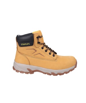 Introducing the Tradesman Safety Boot from Stanleya top-tier choice for durability and comfort on the job. Crafted with a premium quality leather upper, these boots are both lightweight and flexible, ensuring ease of movement without compromising on protection. The rubber and Phylon outsole provides excellent grip and cushioning, while the 200 joule steel toe cap offers robust protection against impacts. Enhanced with a steel midsole for added safety, the Tradesman boots also feature a penetration resistance of 1100 Newtons, safeguarding your feet from sharp objects.
Comfort is paramount with the Tradesman, thanks to its PU collar that cushions your ankle and the Aerospacer lining that promotes breathability, keeping your feet cool and dry by allowing moisture to evaporate efficiently. Whether you're on the move or standing for long periods, these boots deliver the protection and comfort you need to tackle any challenge with confidence.

- Leather upper
- PU cushioned collar
- Aerospacer ling for enhanced breathability
- 200 Steel Toe-Cap
- Steel midsole
- Rubber and Phylon outsolefor enhanced grip and cushioning