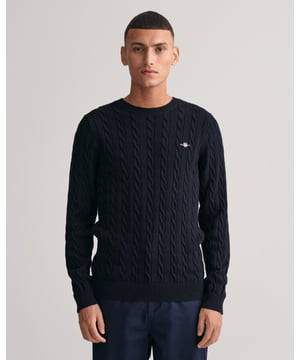 Designed in a soft cotton all-over cable knit, this sweater features our classic GANT shield embroidered at the chest, and ribbed endings at the hem and cuffs. A cable knit sweater adds a dimension of texture to your ensemble and pairs well with jeans and pants alike.
Regular fit  Crew neck  GANT graphic embroidered at chest
&nbsp;
Cotton 100%
&nbsp;
8050601
&nbsp;
&nbsp;
