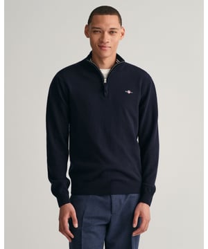 Your classic, wear-with-anything sweater. Crafted from 100% superfine lambswool, this sweater with a half-zip collar is perfect for layering. Cut for a regular fit with ribbed detailing at the hem and cuffs, this sweater is versatile and soft enough to justify getting one in every color.
Regular fit  Half-zip collar  Rib endings at hem and sleeve cuffs  GANT graphic embroidered at chest
&nbsp;
Lambswool 100%
&nbsp;
87213
&nbsp;
&nbsp;