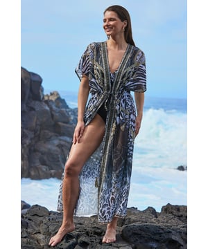 REASONS TO BUY:

Worth booking a holiday for
Crafted from a gorgeous floaty fabric
That print is guaranteed to get compliments
Batwing sleeves for added glamour
Drawstring detail to cinch in your waist
Throw over swimwear for al fresco lunches