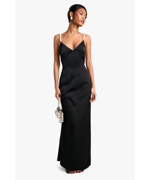 Give your wardrobe a glow up this season with a fit and flare dress from our latest collection. Featuring a fitted upper body and a full skirt to accentuate your waist and create a flattering silhouette, this style is perfect for date night, weddings and beyond. From fit and flare dresses with sleeves to midi styles with lace detailing, just pair with barely-there heels and simple accessories and let your dress do the talking with this statement style.Style: Fit & Flare DressDesign: PlainFabric: SatinLength: MaxiNeckline: V NeckSleeve Length: Sleeveless