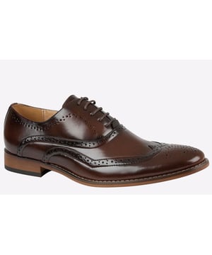 Goor present their Dillinger Brogue Oxford shoes, a sophisticated blend of timeless style and comfort, enhanced with seamless brogue detailing and a polished finish, making them the perfect versatile choice weather youre heading to the party or any other special event. Completing the shoes is leather quarter lining and a secure lace up system to ensure feet stay comfortable with each wear. 
 - - Synthetic upper 
 - - Brogue detailing 
 - - Leather quarter lining 
 - - Resin Sole 
 - - Secure Lace-up system 
 - -  sock