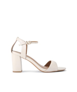 The KG Kurt Geiger Fleur block heel is crafted from a bone leather alternative fabric. The ankle strap is fastened with a gold buckle with KG Kurt Geiger tab. Heel height: 7.5cm.