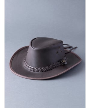 The ever popular Australian style leather hat in brown, crafted from water resistant cracked leather making it the perfect accessory come rain or shine. A rugged look is finished with a plaited leather trim, Lakeland embossed press studs and vented eyelets. It is the perfect accessory to finalise your outfit.The DetailsBrand: Lakeland LeatherStyle Name: Outback III Australian Style HatColour: BrownMaterial: Waxed Colorado LeatherSize GuideSmall = 57cmMedium = 59cmLarge = 61cm