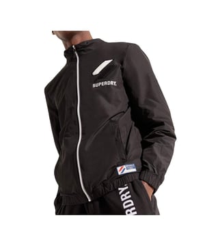 Superdry Track Jacke für Herren Schwarz Synthetisch. Authentisches Kleidungsstück der Marke Superdry - Streetwear/Sportswear-Design von Superdry - modische Superdry-Kleidung für Herren, perfekt für den Alltag - Die schwarze Superdry Jacke lässt sich hervorragend mit dem Rest Ihrer Garderobe kombinieren - bequeme synthetische Materialien - klassisch - Track -