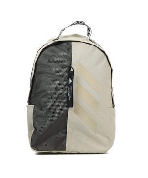 adidas Classic 3- Stripes Backpack in beige.- Padded adjustable shoulder straps.- Front zip pocket.- Side water bottle pocket.- Iconic 3-Stripes.- Volume: 26.5 L- Main material: 100% Polyester (Recycled).  Lining: 100% Polyester. Padding: 100% Polyethylene.- Ref: FT8764Measurements are intended for guidance only